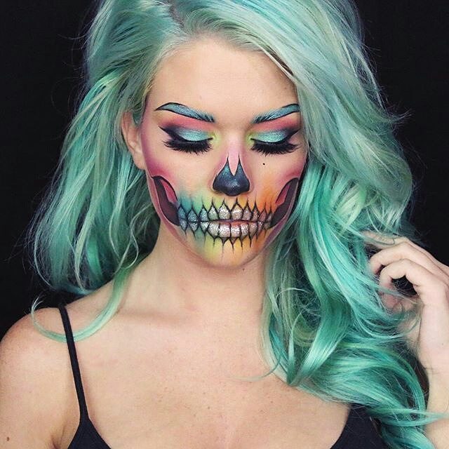 Gorgeous colorful Sugar skull Halloween Makeup. 10 gorgeous halloween makeup looks! Cheetah makeup, spider girl makeup, deer makeup, doe makeup, fawn makeup, fairy makeup, pop art makeup, fairy makeup, unicorn makeup, mermaid makeup, sugar skull makeup. Love this site with all of the gorgeous inspiration.